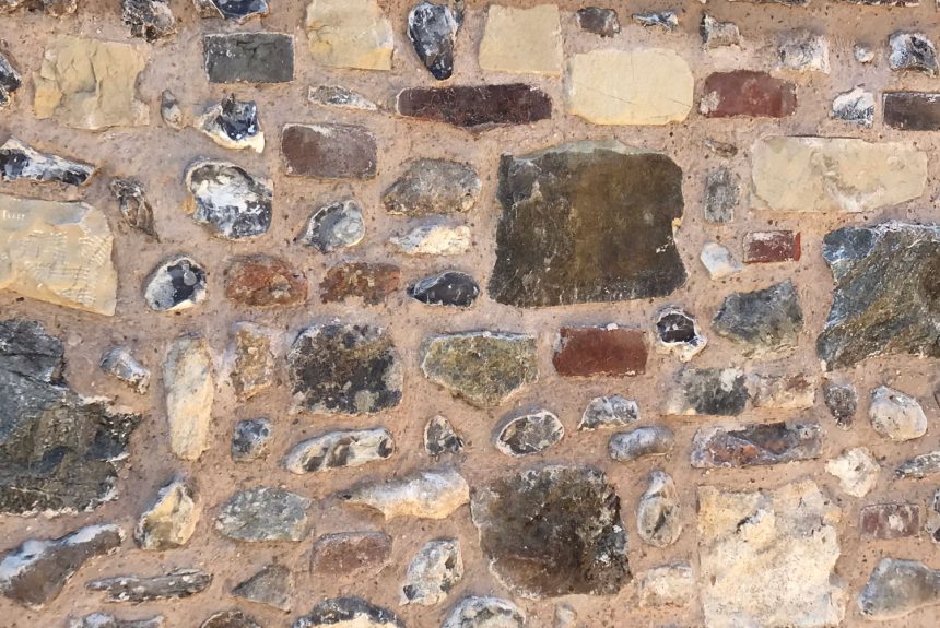 Close up of the completed flint stone wall