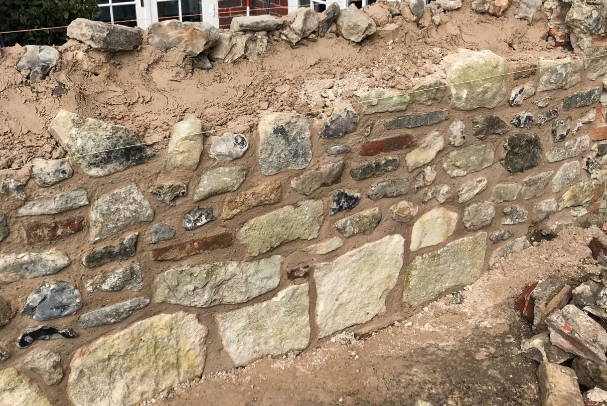 Listed Flint Stone Wall in Chichester Professional Property Services