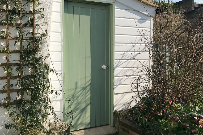 Entrance door to the completed outhouse